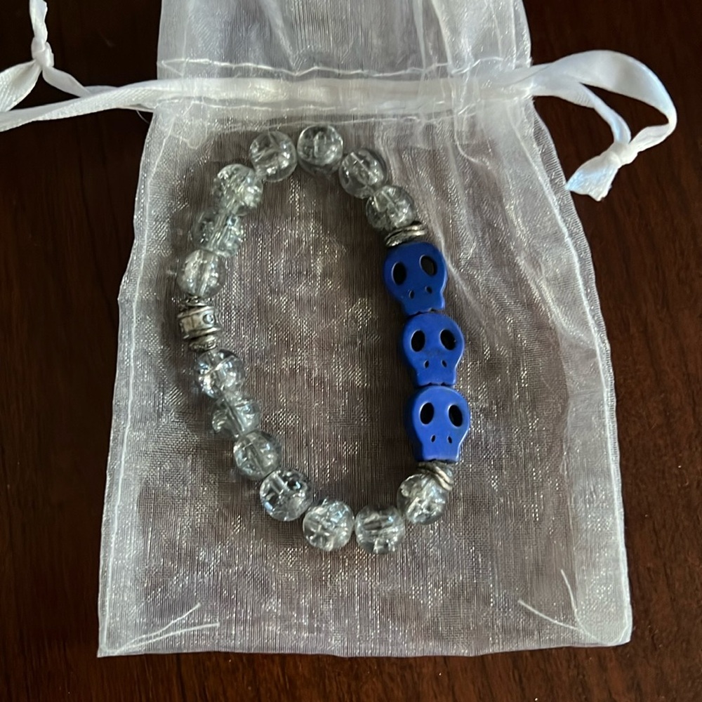 Chavez for Charity blue skull bracelet with clear beads